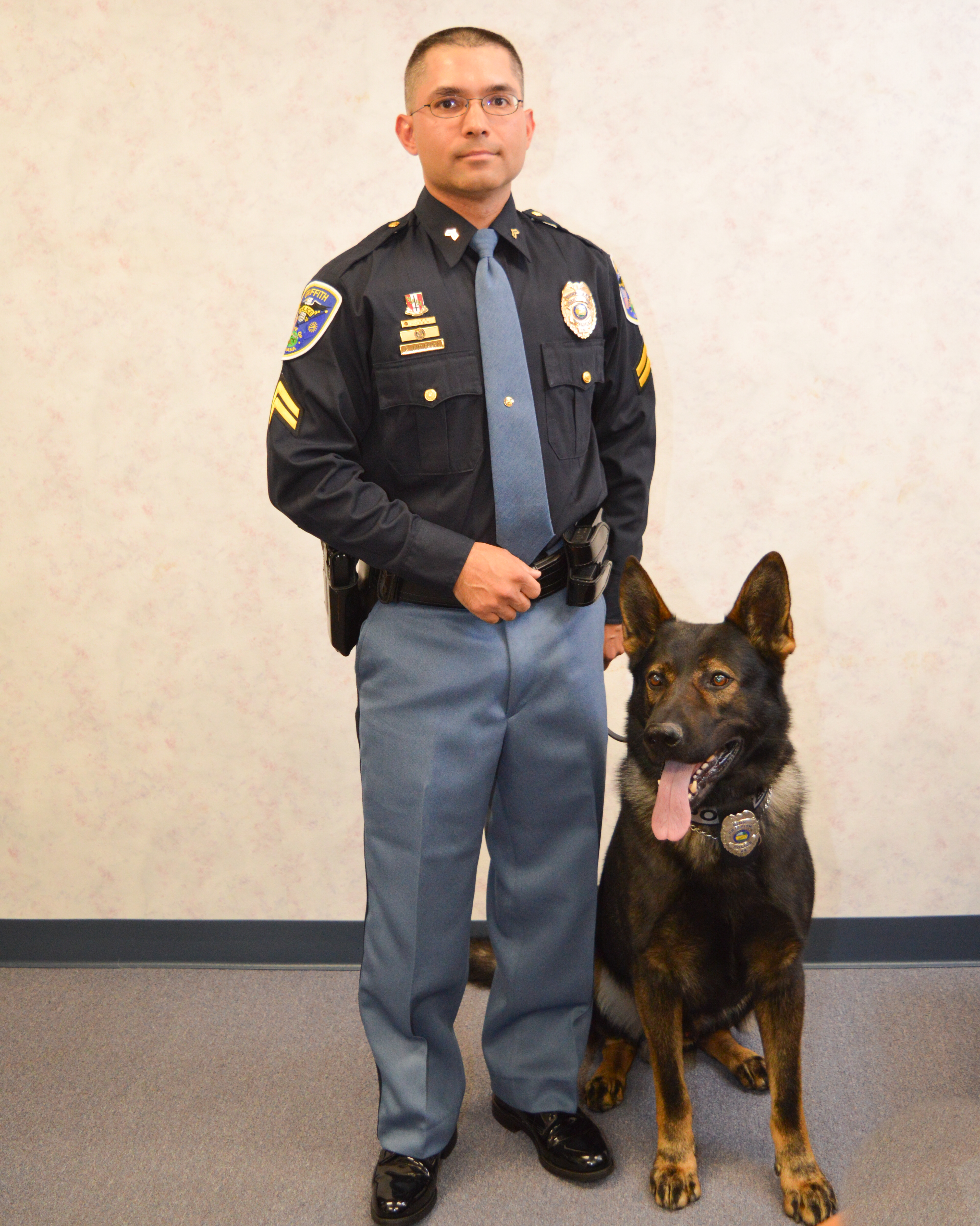 Image of Corporal Gutierrez and K9 Gino